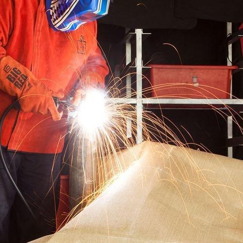 Vermiculite coated fiberglass welding blanket used for welding fire and spark protection